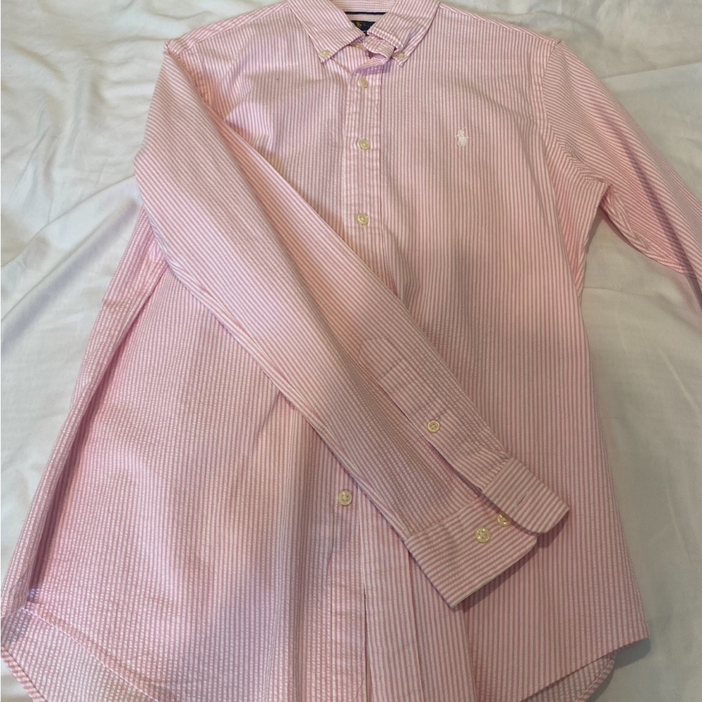 Men’s Polo Button up. Size Small. Never been worn.